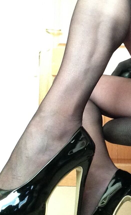 horny crossdresser in black pantyhose