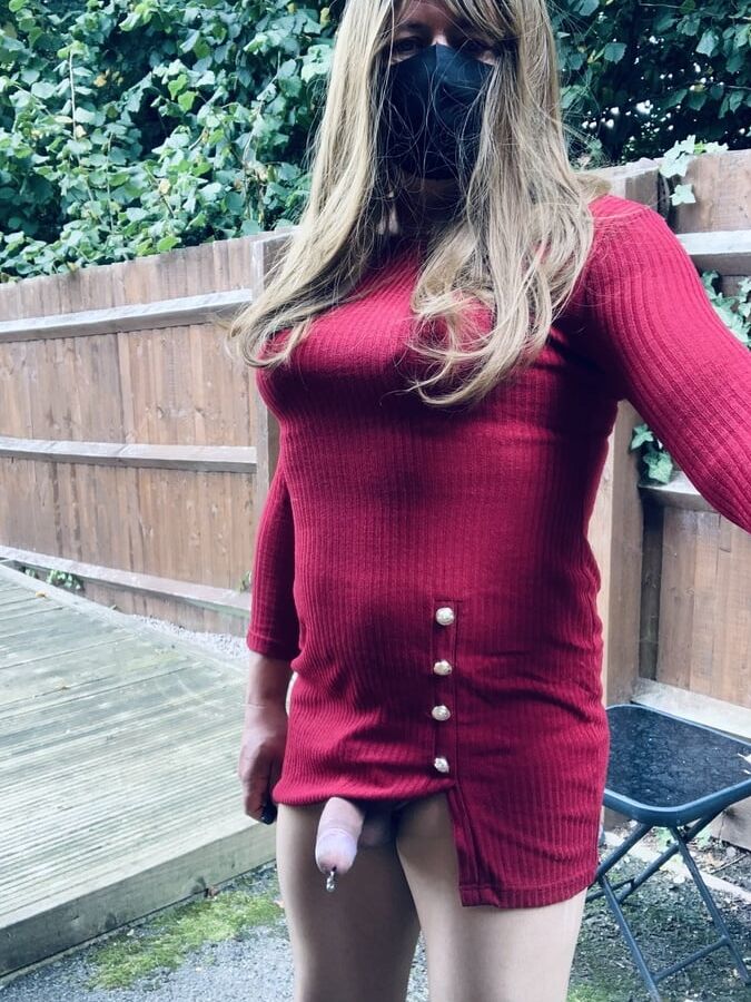 Kelly in burgundy dress and nude tights with heels