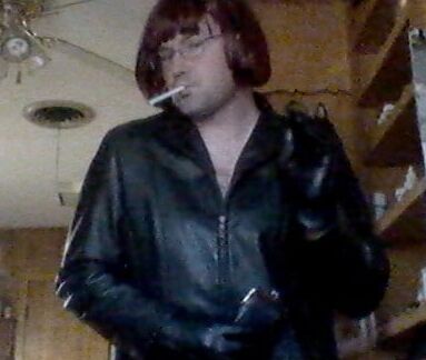 Jenna smoking in leather