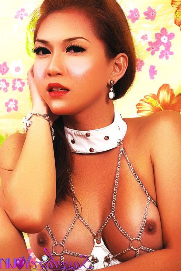 Sapphire Young wearing Chains