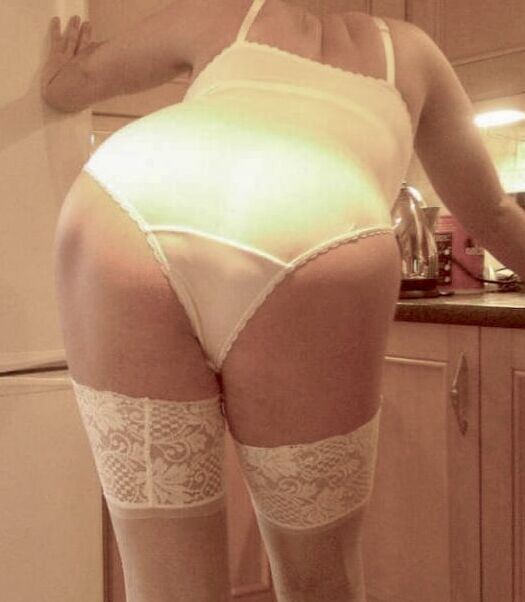 White bodysuit and fishnets