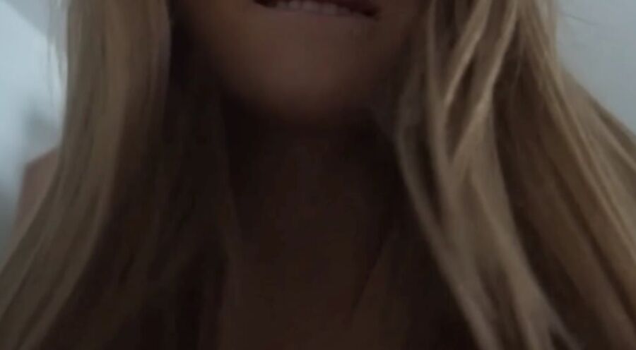 Hottie flirting on webcam close up.