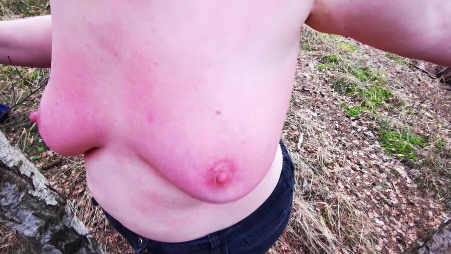 Titslapping in woods