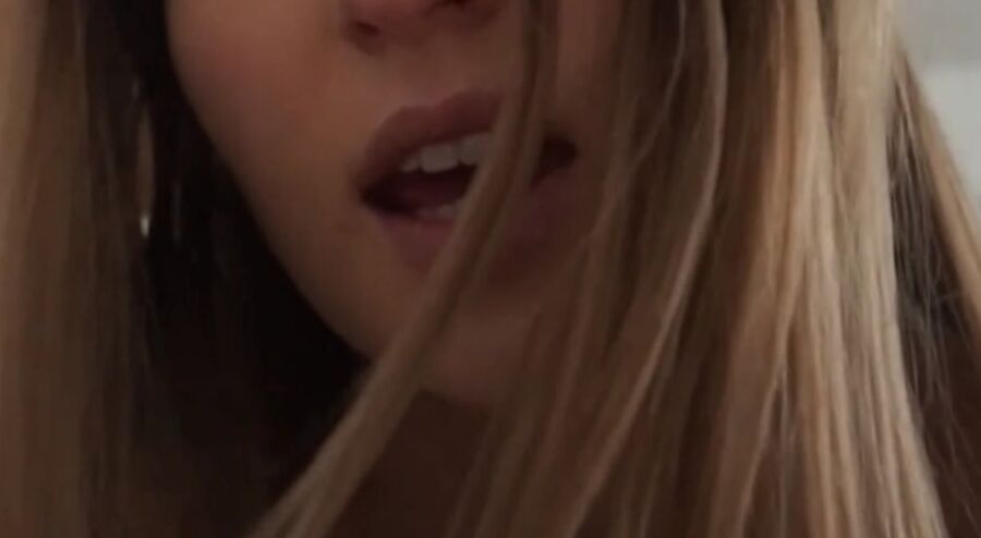 Hottie flirting on webcam close up.