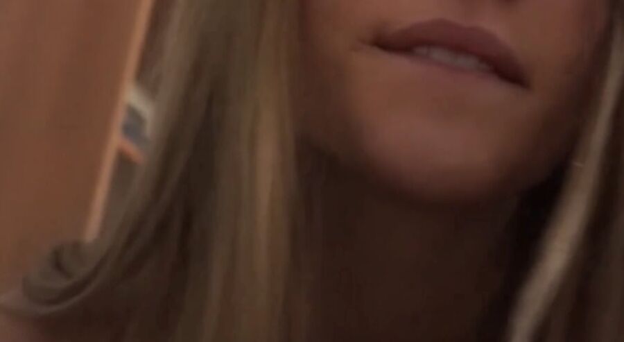 Hottie flirting on webcam close up.