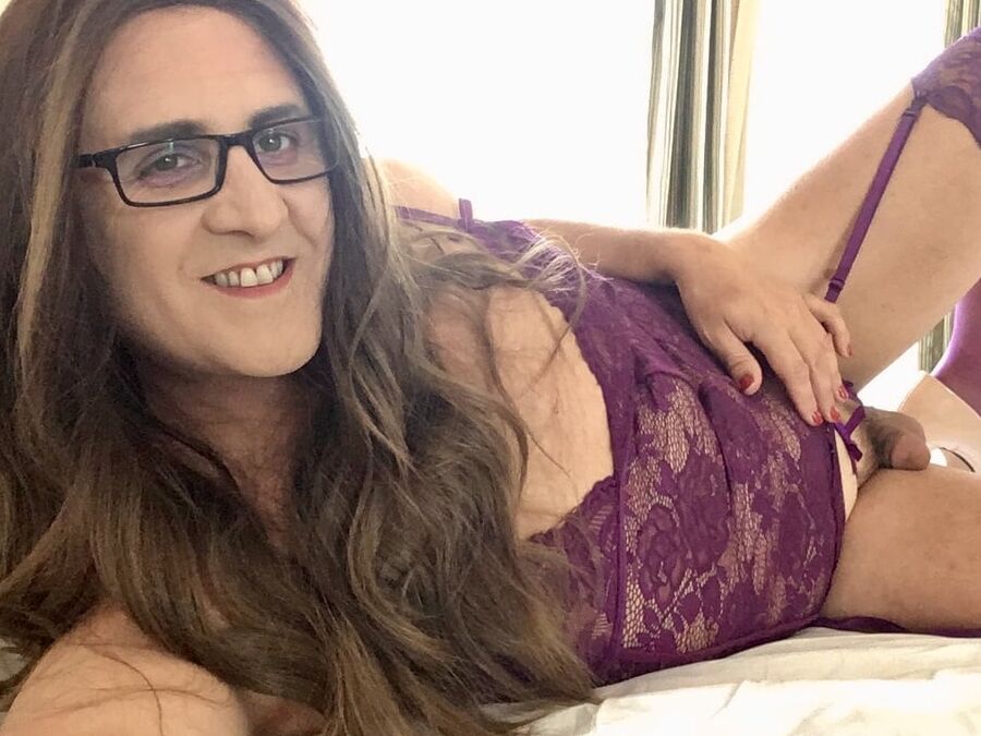 Dressed in Purple in need of some cock