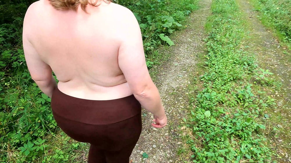 Topless hiking and slapping tits