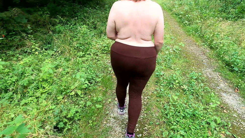 Topless hiking and slapping tits