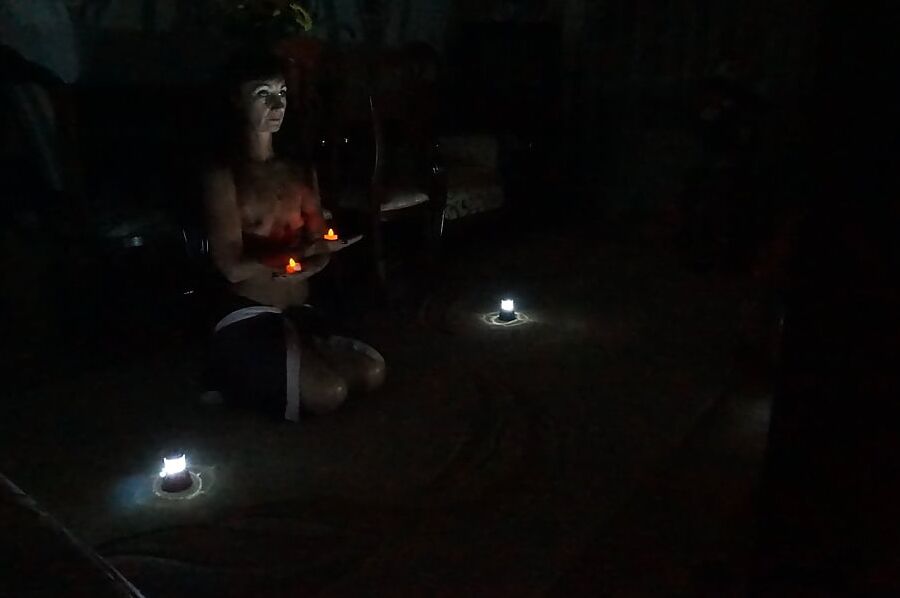 In darkness with candles