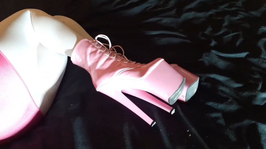 Pink platform heels and white stockings