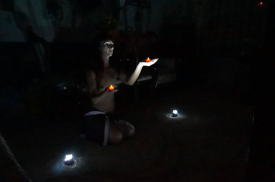 In darkness with candles