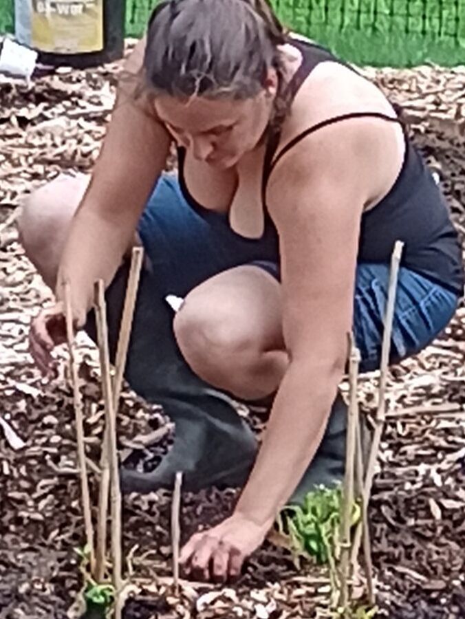 Big hanging tits while gardening