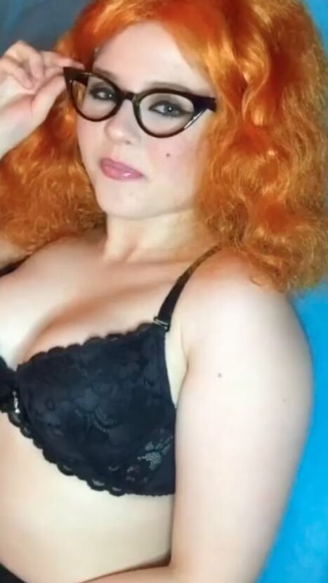 Cute redhead in lingerie