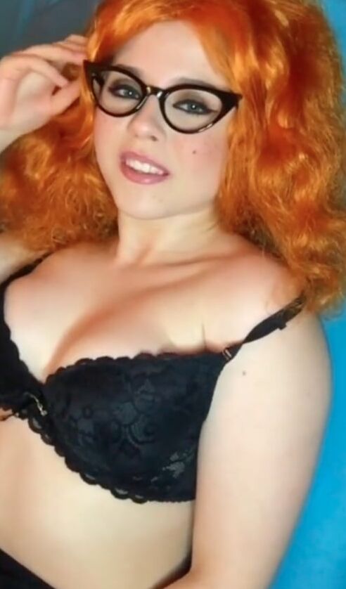 Cute redhead in lingerie