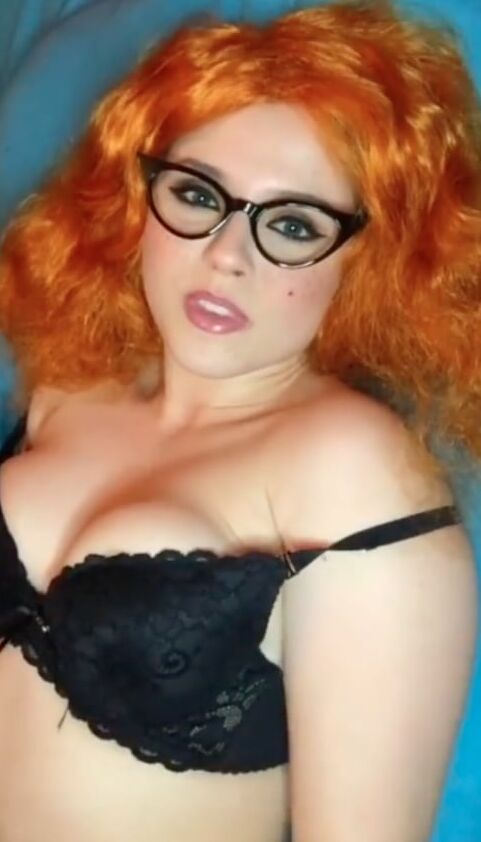 Cute redhead in lingerie