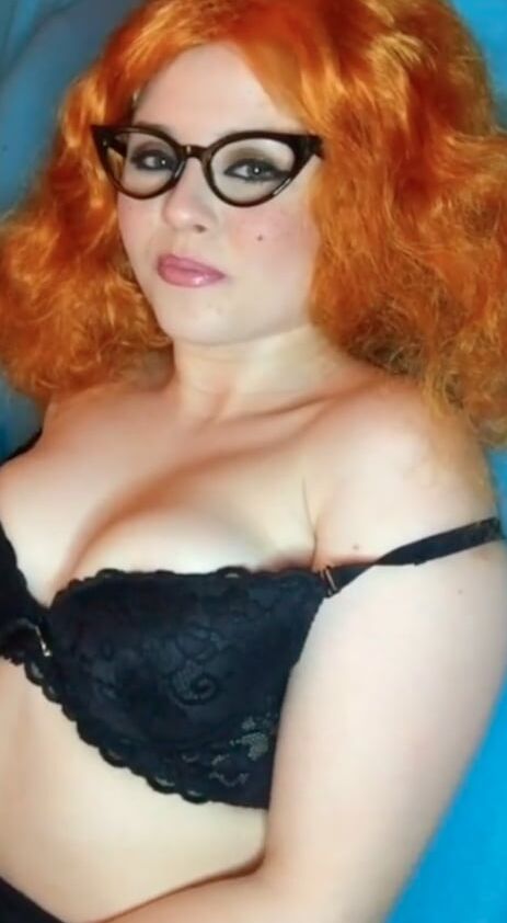 Cute redhead in lingerie