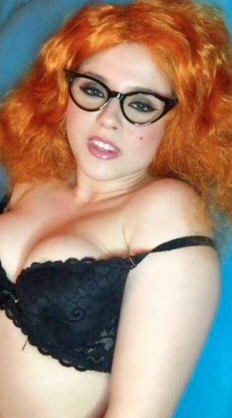Cute redhead in lingerie
