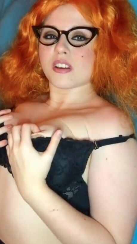 Cute redhead in lingerie