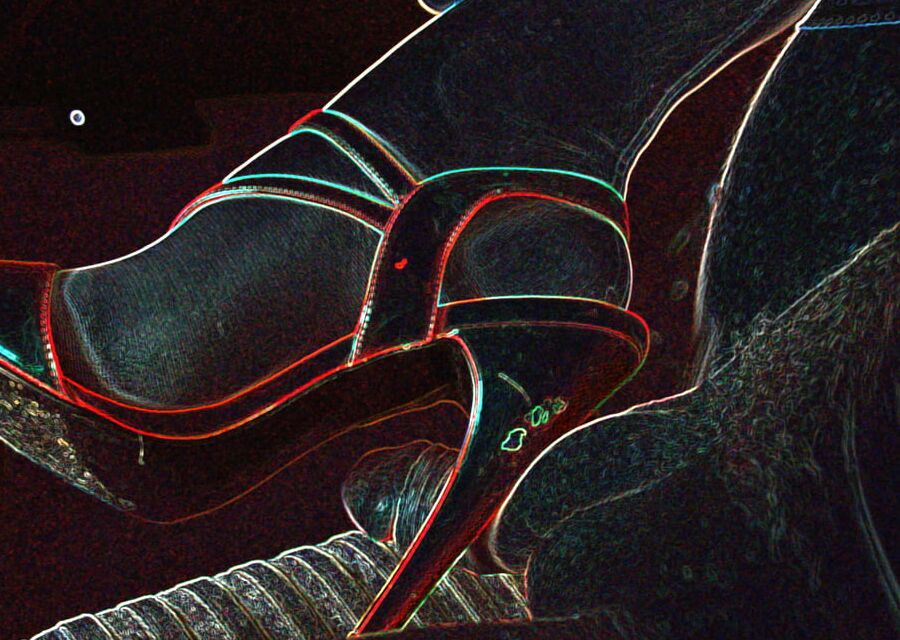 Luminous contours of legs, heels and ass