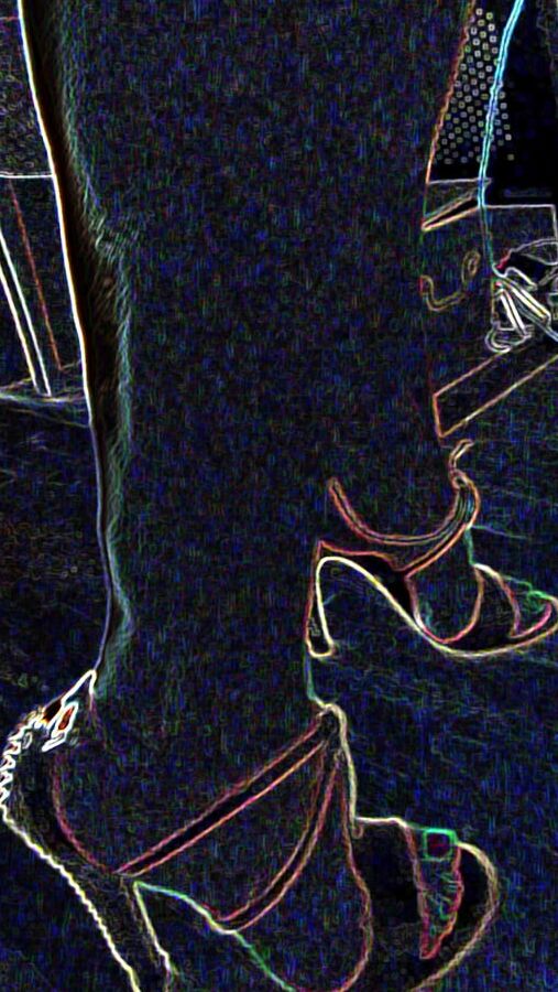 Luminous contours of legs, heels and ass