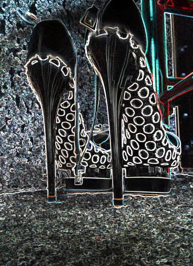Luminous contours of legs, heels and ass