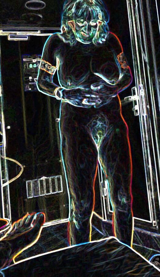 Luminous contours of legs, heels and ass