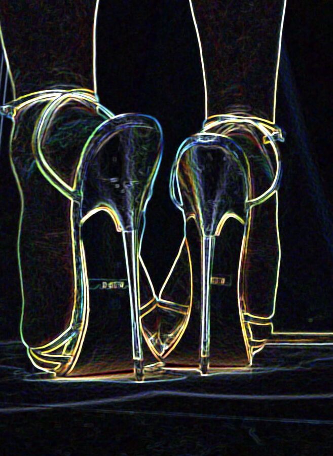 Luminous contours of legs, heels and ass