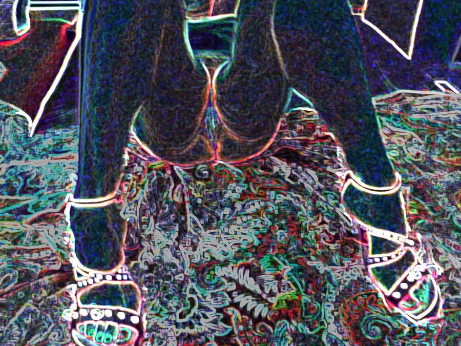 Luminous contours of legs, heels and ass