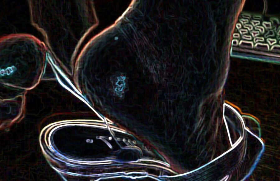 Luminous contours of legs, heels and ass