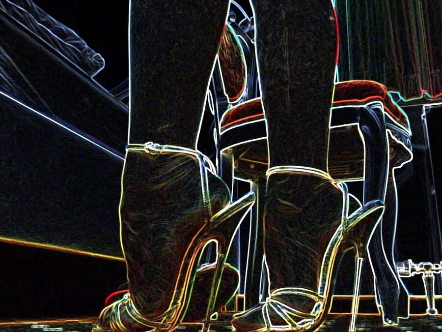 Luminous contours of legs, heels and ass