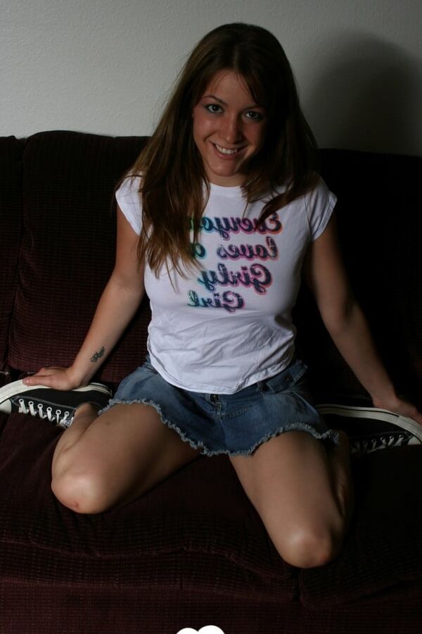 Brunette chick spreads her legs to tease herself