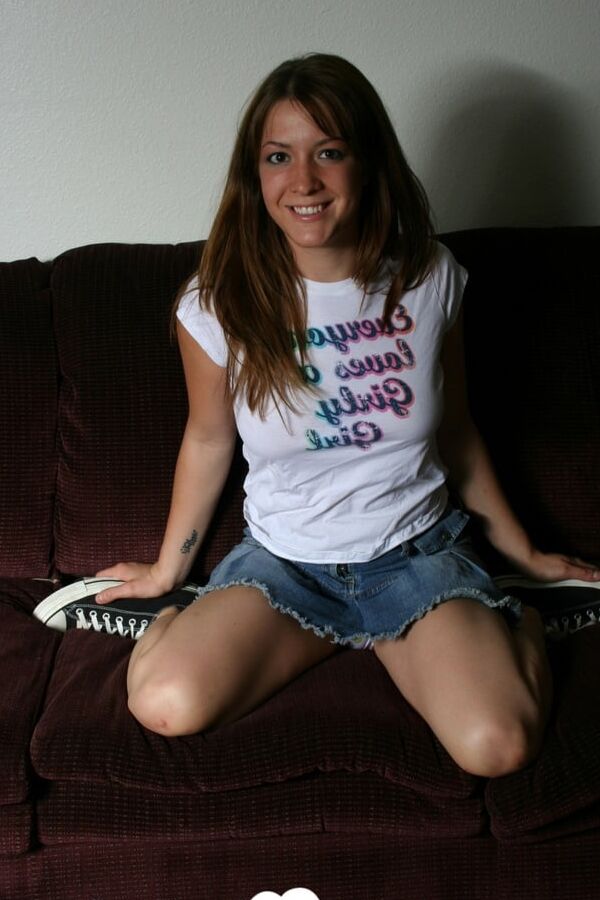 Brunette chick spreads her legs to tease herself