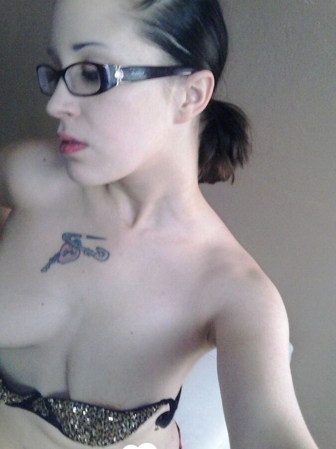 Nerdy girl sensually fingers her wet snatch