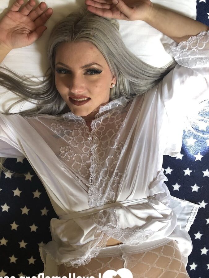 Fooling around in a naughty outfit on camera
