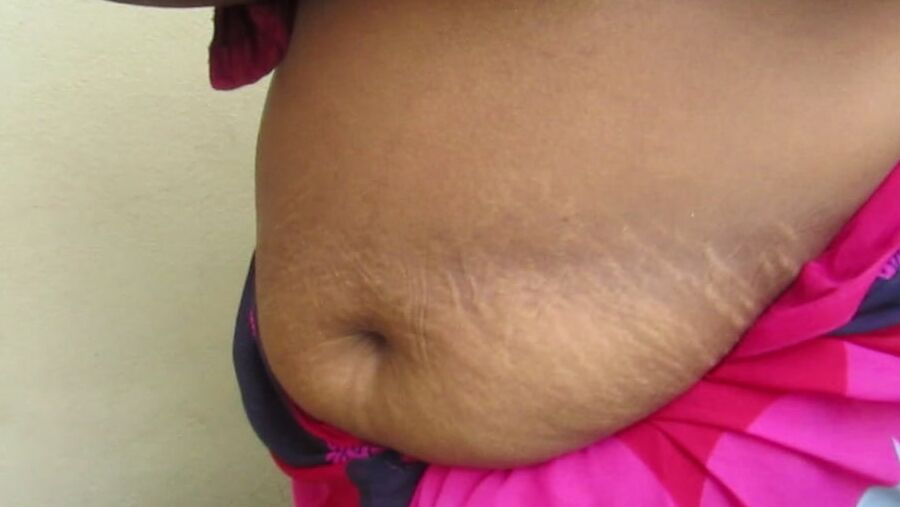 Tamil horny aunty standing to showing her boobs