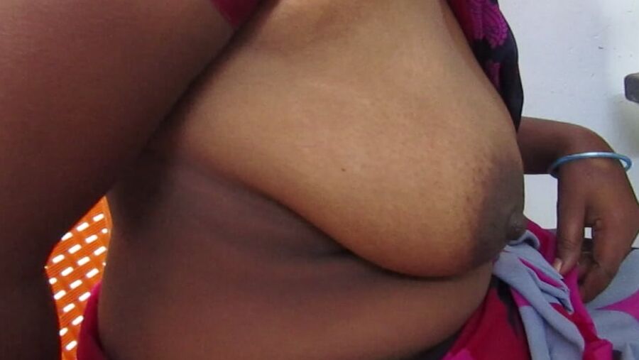 Tamil horny aunty showing her boobs
