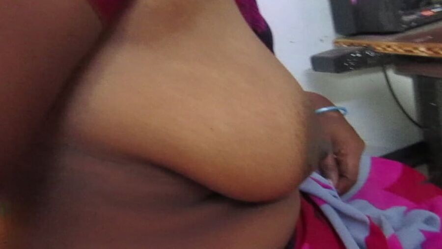 Tamil horny aunty showing her boobs