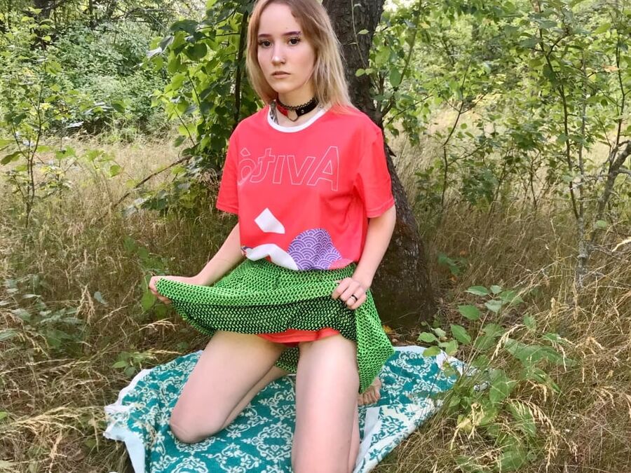 Hot teen strips naked in the woods