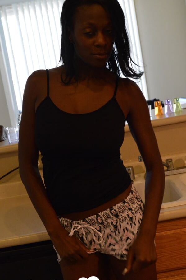 Ebony woman shows off both sides of her