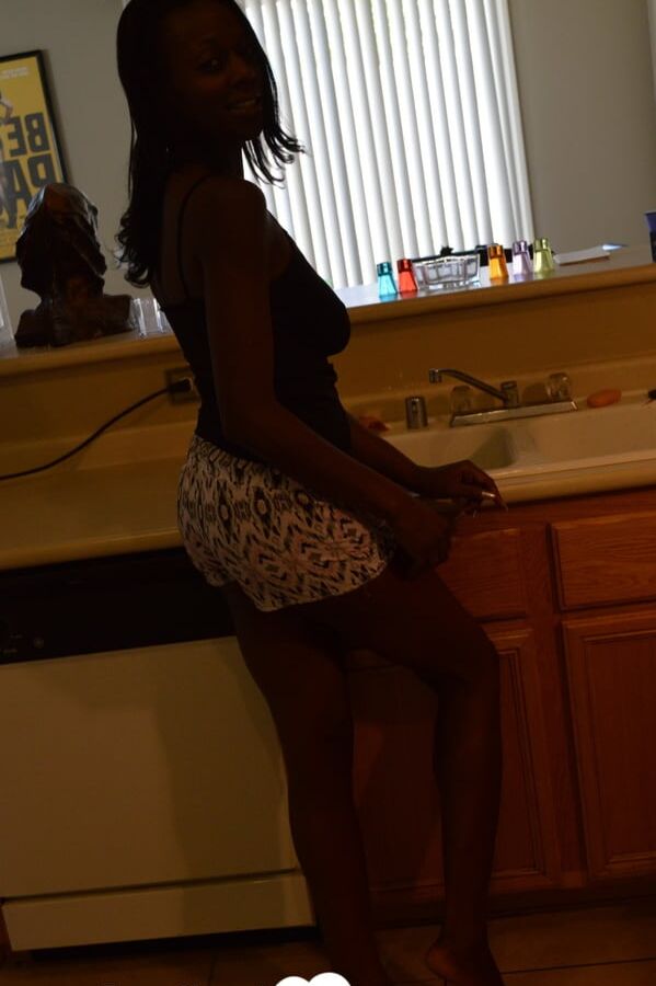 Ebony woman shows off both sides of her