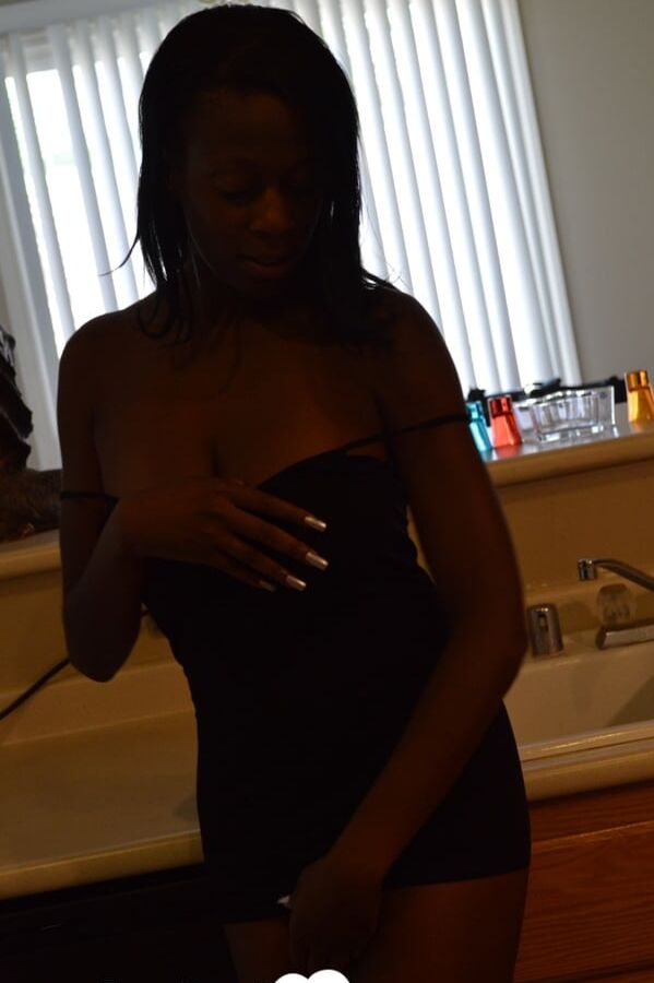 Ebony woman shows off both sides of her