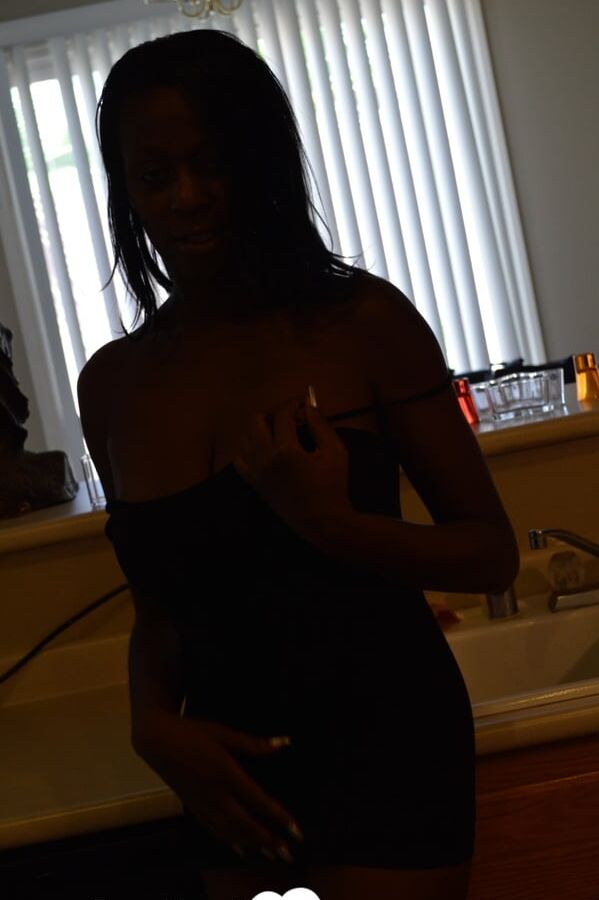 Ebony woman shows off both sides of her