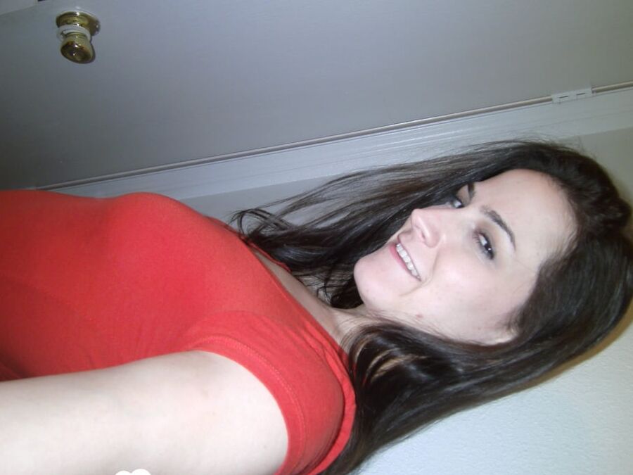 Magnificent brunette lifts her skirt and shirt up