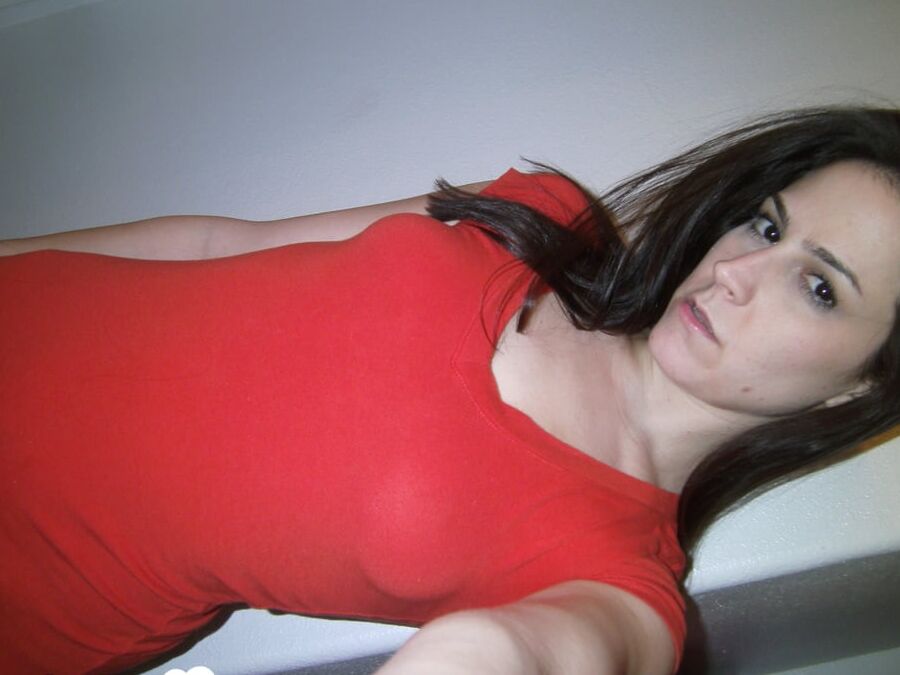 Magnificent brunette lifts her skirt and shirt up