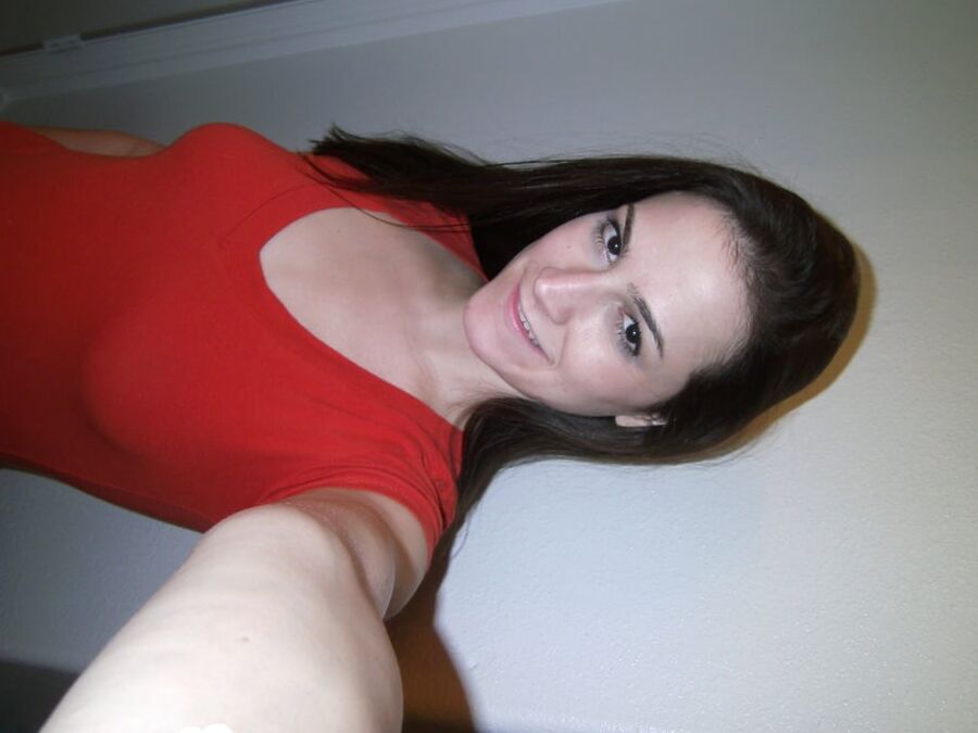 Magnificent brunette lifts her skirt and shirt up