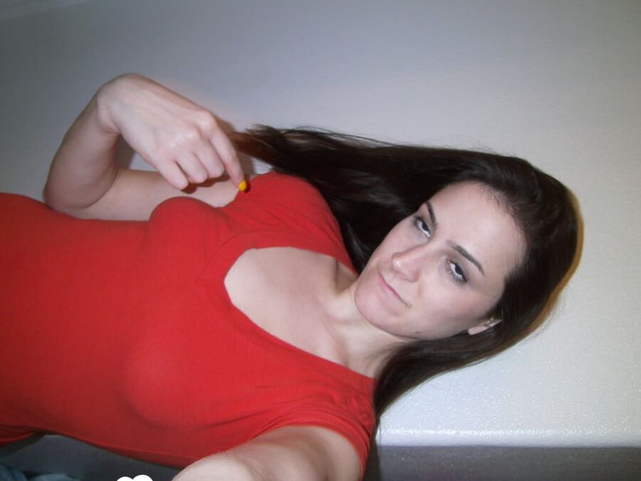 Magnificent brunette lifts her skirt and shirt up