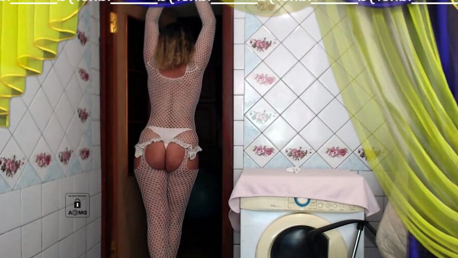 Old body of sexy Lukerya in white fishnet with visible nippl