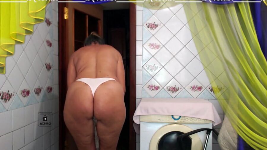 Old body of sexy Lukerya in white fishnet with visible nippl