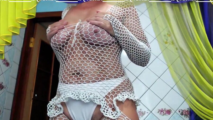 Old body of sexy Lukerya in white fishnet with visible nippl