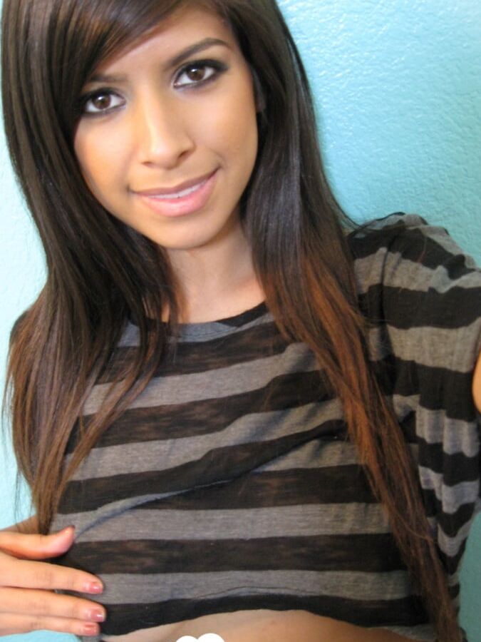 Brunette teases a bit in the bathroom
